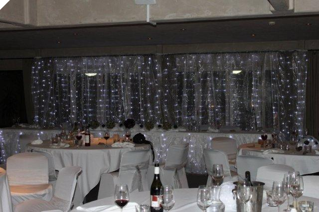 Backdrop created with Organza Fabric and fairylights
